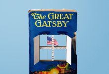 photo of The Great Gatsby with a window cut through the center, revealing an American flag