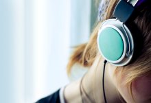 Child wearing headphones to help with sensory needs