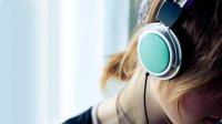 Child wearing headphones to help with sensory needs