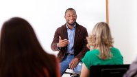 Guest speaker in high school classroom