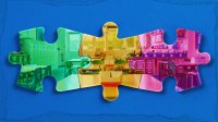 A collage of three puzzle pieces creating the image of a classroom