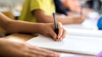 Hand writing in notebook