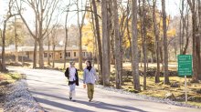 two students walk the grounds at The Greene School