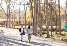 two students walk the grounds at The Greene School