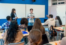 Student leading an opening activity in class