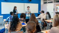 Student leading an opening activity in class