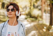 Person on a walk while wearing headphones