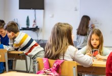 Elementary students working at math centers