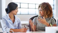 Two women talking