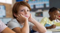 Disengaged elementary student in class