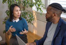 Two colleagues talking