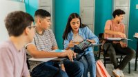 Students using tablet in class