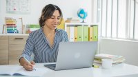 Teacher using AI tools on the computer