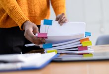 Person sorting papers