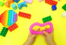Child playing with sensory toys