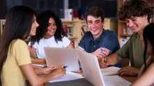 A photo of high schoolers working collaboratively in a group.