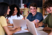 A photo of high schoolers working collaboratively in a group.