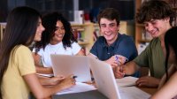 A photo of high schoolers working collaboratively in a group.