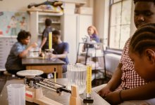 Middle school students doing an experiment in science class