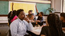 Student pausing and thinking in class