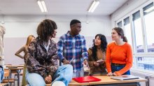 High school students talking in class