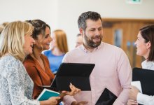 Small group of teachers talking