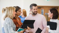 Small group of teachers talking