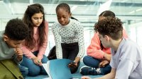 Middle school students working together