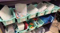 A close-up photo of Tiffany Perry's bin and shelf system for her science materials.