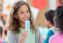 Elementary students using math flash cards