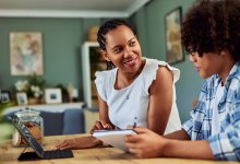 Tween son talking to his mother about schoolwork