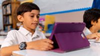 Elementary student using a tablet