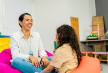 School counselor meeting with elementary student