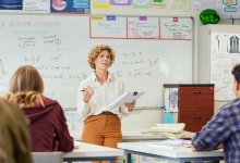 High school teacher talking to class