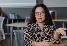 Woman talking to coworker