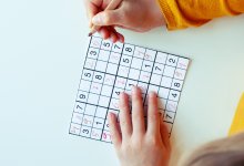 Elementary student working on a sodoku puzzle