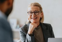 Woman listening to coworker
