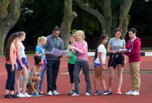 A photo physical education teachers facilitating a class project.