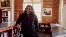Author Jason Reynolds in a school library