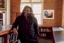 Author Jason Reynolds in a school library