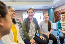 Older students talking to younger students