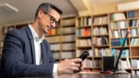 Teacher using a smartphone
