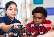 Middle school students working on a project in class