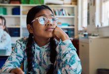 Student looking out the window in class