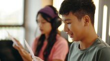High school students working on a radio theater project