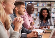 A group of parents and teachers having a meeting in a library about AI policies