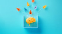 Multicolored paper planes flying from a brain in a small enclosure