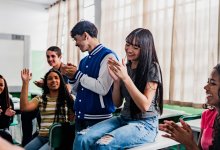 High school students playing games in class