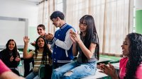 High school students playing games in class