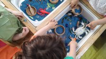 Students playing with ocean-themed toys